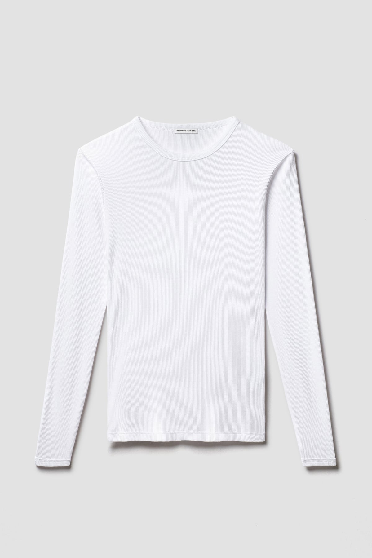 Maillot de corps blanc à manches longues en coton Pima côtelé, vue de face sur fond clair.